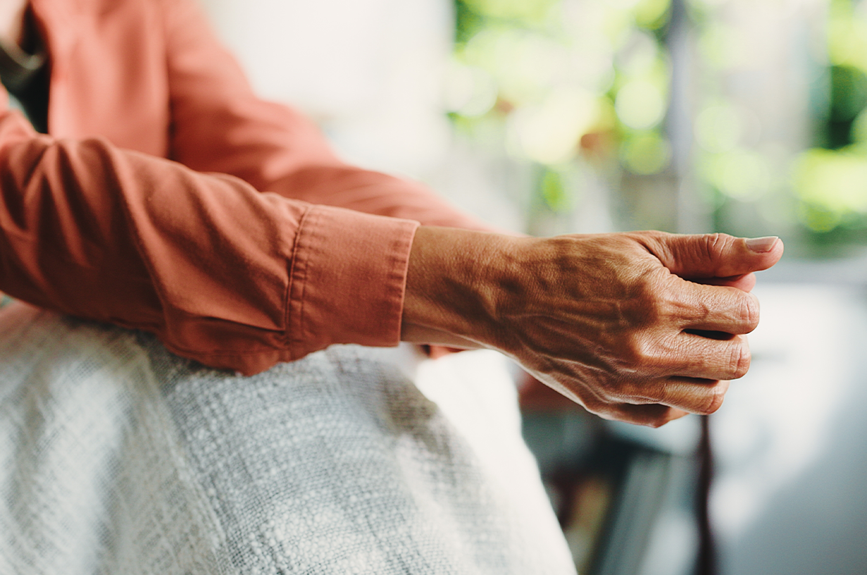 Person sitting quietly representing the impact of words on trust in grief