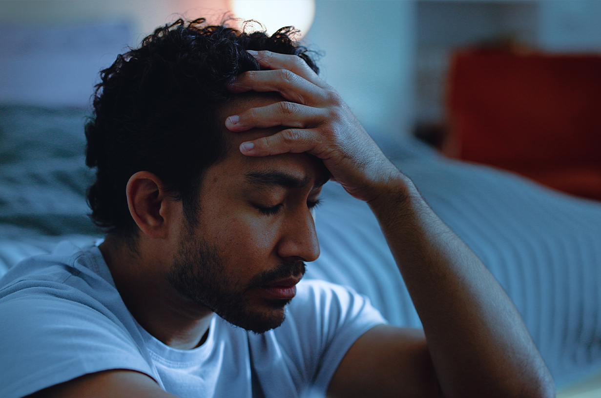 Man sitting alone struggling with ambiguous loss and estrangement